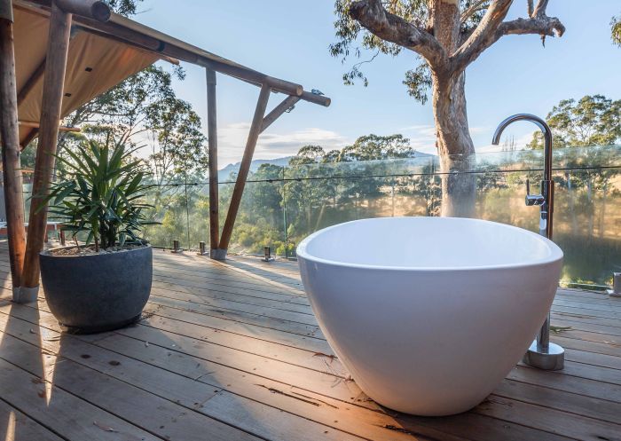 Currajong Retreat, Burragate - Credit: David Rogers Bath on verandah at Currajong Retreat, Burragate